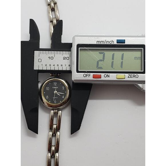 Women\'s Timex. Small black face. Bracelet style band. main image 6